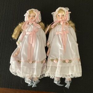 Elegant Pink and White Porcelain Dolls